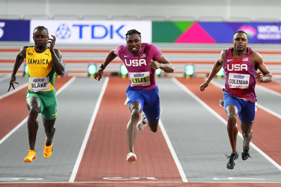 Christian Coleman edges Noah Lyles in battle for 60 meter gold at world indoor championships