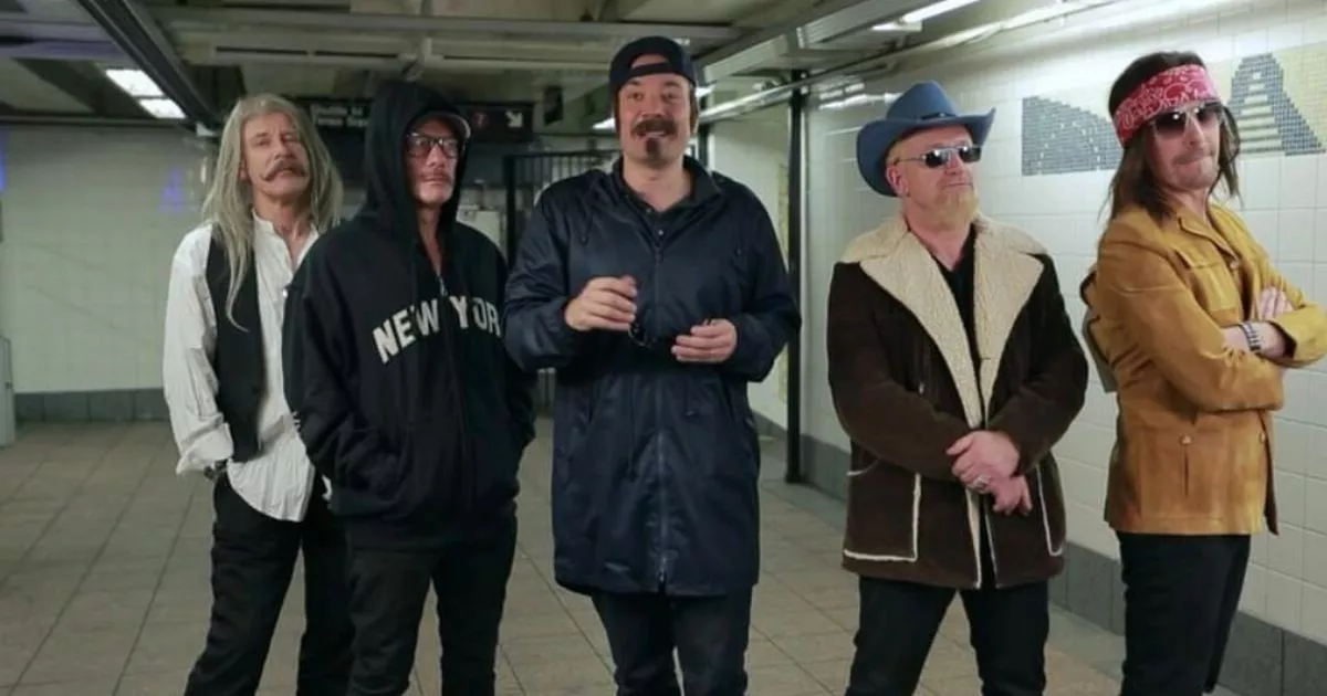 Jimmy Fallon and U2 busk undercover in disguise at New York subway station